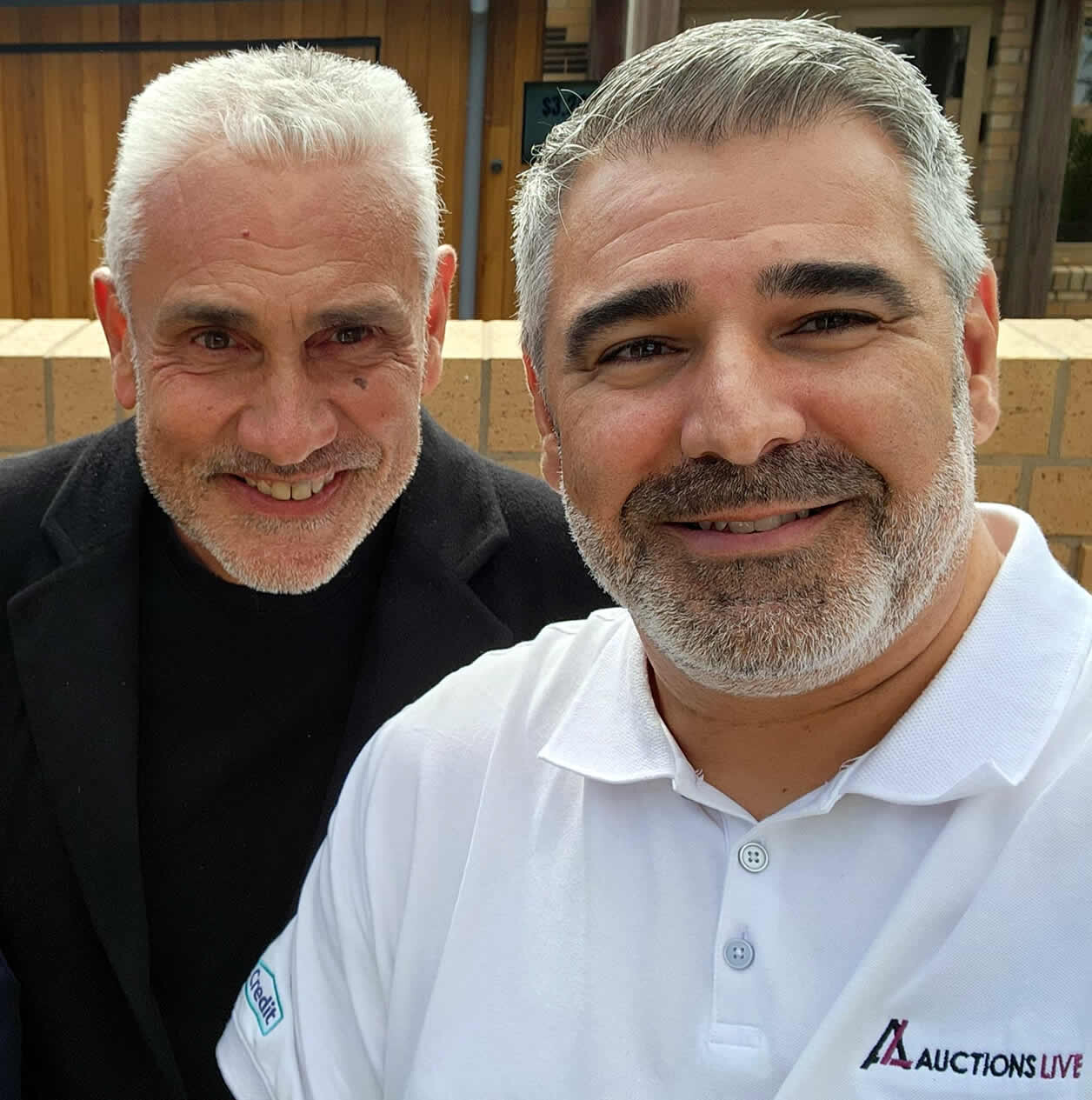 Auctioneer Tom Panos with Nathan Portelli from Auctions Live